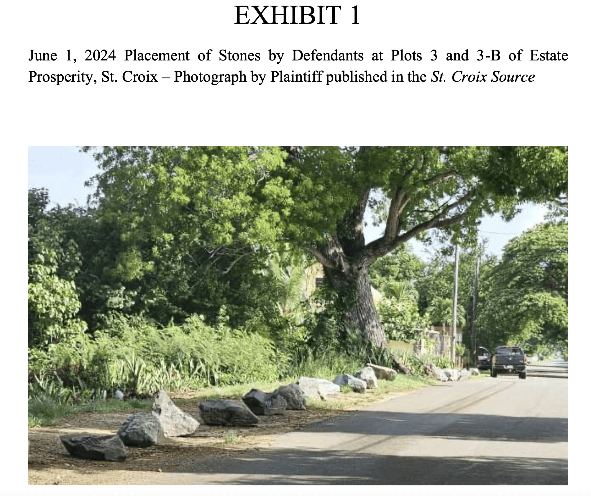 An exhibit in a lawsuit over beach access in Estate Prosperity on St. Croix shows boulders placed along a beachfront property that plaintiffs in the case said made access difficult. (Screenshot of court filing)